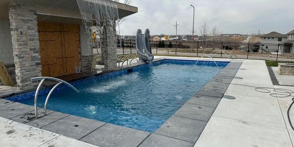 Custom inground pool with waterfall feature